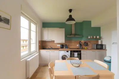 Cuisine ou kitchenette dans l'établissement Appartement Cosy avec garage privé