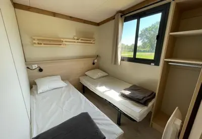 Un ou plusieurs lits dans un hébergement de l'établissement Camping Onlycamp Le Pont Romain