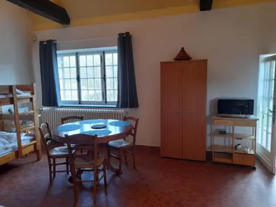Télévision ou salle de divertissement dans l'établissement Le Moulin du Châtelier