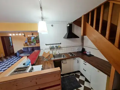 Cuisine ou kitchenette dans l'établissement Gîte de l'orangerie du château de Jallanges- 11 personnes