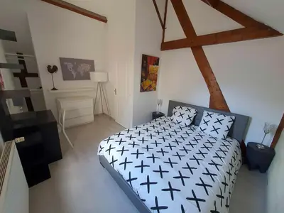 Un ou plusieurs lits dans un hébergement de l'établissement Gîte de l'orangerie du château de Jallanges- 11 personnes