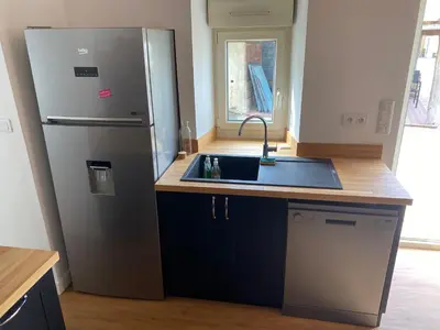Cuisine ou kitchenette dans l'établissement Aux Premières Loges - Gîte de charme proche du circuit