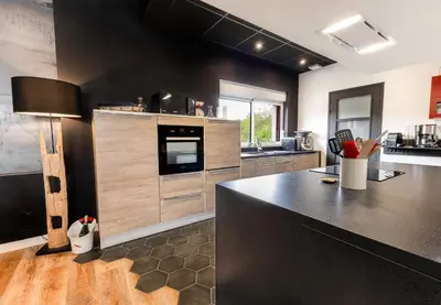 Cuisine ou kitchenette dans l'établissement LE PADDOCK 