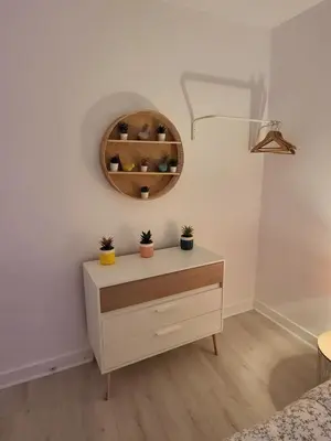 Un ou plusieurs lits dans un hébergement de l'établissement Appartement zen et calme, centre ville