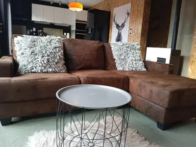 Coin salon dans l'établissement Gite atypique calme en centre ville avec option spa