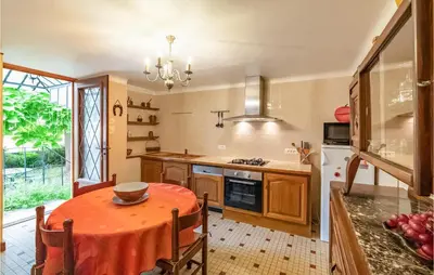 Cuisine ou kitchenette dans l'établissement La Haie
