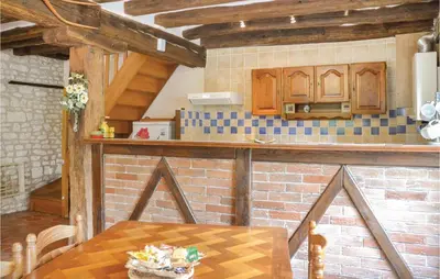Cuisine ou kitchenette dans l'établissement Murier