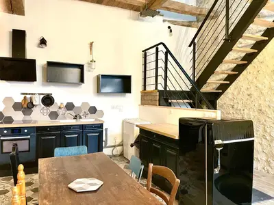 Télévision ou salle de divertissement dans l'établissement CAPORIZON-La Grange-Le Clos de Chambord