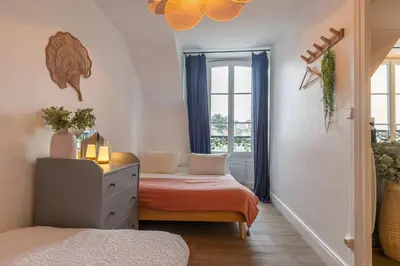 Un ou plusieurs lits dans un hébergement de l'établissement ☆ Sur les toits de Blois ☆ T2 avec vue Château