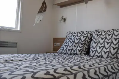 Un ou plusieurs lits dans un hébergement de l'établissement Mobil Home tout confort 6 personnes avec wifi