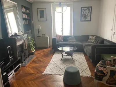 Coin salon dans l'établissement Maison tout confort Centre ville - Tramway direct Circuit 24H du Mans à 200m - Parking Gratuit