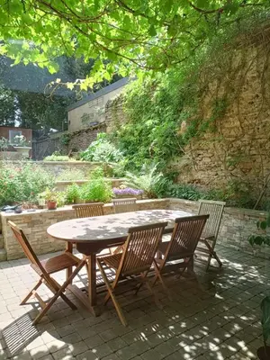 Jardin de l'établissement Maison tout confort Centre ville - Tramway direct Circuit 24H du Mans à 200m - Parking Gratuit