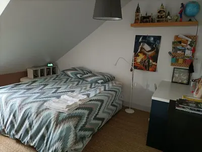 Un ou plusieurs lits dans un hébergement de l'établissement Maison tout confort Centre ville - Tramway direct Circuit 24H du Mans à 200m - Parking Gratuit