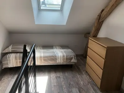 Un ou plusieurs lits dans un hébergement de l'établissement Gîte au calme entièrement rénové