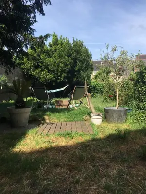 Jardin de l'établissement Maison cosy à 2km du circuit bugatti des 24h