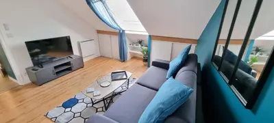 Coin salon dans l'établissement L'appart K-torze- RARE ! 14 couchages en centre ville du Mans