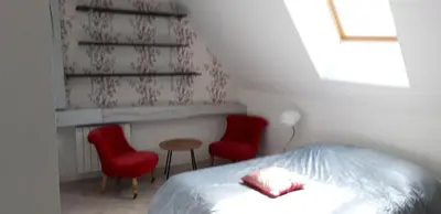 Un ou plusieurs lits dans un hébergement de l'établissement Triplex tout confort, plein centre ville Bauge en Anjou