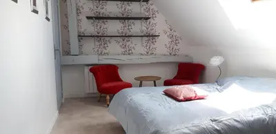 Un ou plusieurs lits dans un hébergement de l'établissement Triplex tout confort, plein centre ville Bauge en Anjou