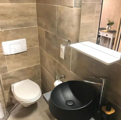 Salle de bains dans l'établissement Appart-Studio Daniella