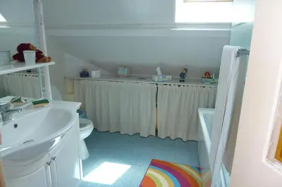 Salle de bains dans l'établissement Chambres proches circuit