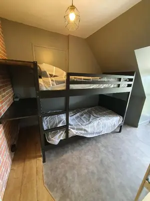 Un ou plusieurs lits dans un hébergement de l'établissement L'Ardoise
