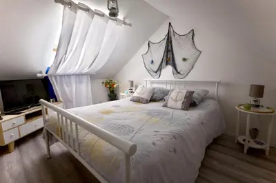 Un ou plusieurs lits dans un hébergement de l'établissement MAISON DE VILLE
