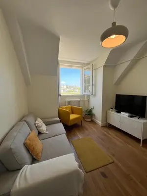 Télévision ou salle de divertissement dans l'établissement Le Wilson - Vue Imprenable sur la Loire et le château de Blois