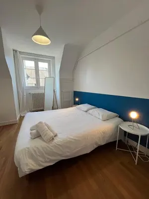 Un ou plusieurs lits dans un hébergement de l'établissement Le Wilson - Vue Imprenable sur la Loire et le château de Blois
