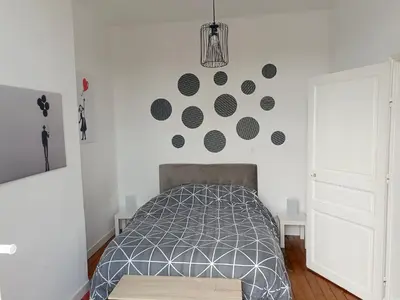 Un ou plusieurs lits dans un hébergement de l'établissement Balcon sur Loire local vélo