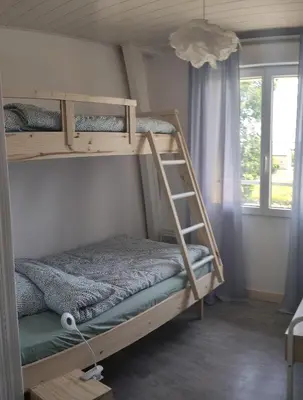 Un ou plusieurs lits dans un hébergement de l'établissement Détente au bord du Loir - Gîte 2