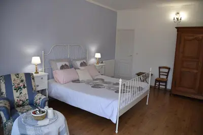 Un ou plusieurs lits dans un hébergement de l'établissement La Little School Chambres d'Hôtes à Arçay