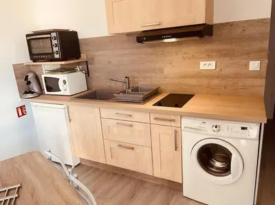 Cuisine ou kitchenette dans l'établissement Superbe appartement à la croisée des 4 Châteaux