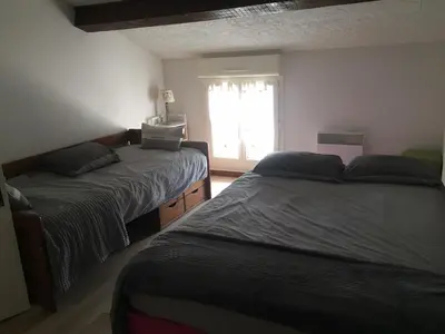 Un ou plusieurs lits dans un hébergement de l'établissement Maison au carrefour des terroirs