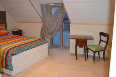 Un ou plusieurs lits dans un hébergement de l'établissement Escale à Villeperdue chambre JÜRMALA