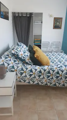 Un ou plusieurs lits dans un hébergement de l'établissement Chambre privée des 2 Clochers