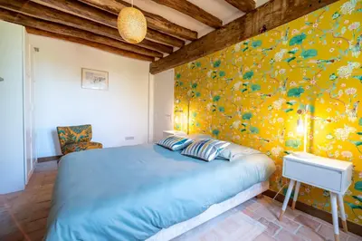 Un ou plusieurs lits dans un hébergement de l'établissement Le Clos Eugenie - Charmante maison avec jardin et vue sur la Loire