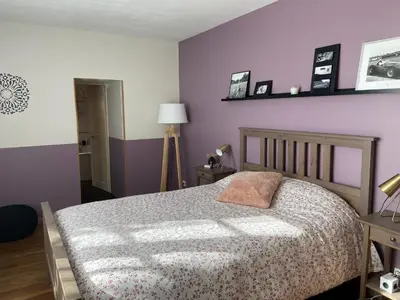 Un ou plusieurs lits dans un hébergement de l'établissement Les chambres de l'atelier