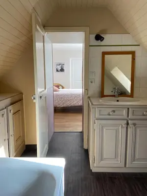 Un ou plusieurs lits dans un hébergement de l'établissement Les chambres de l'atelier