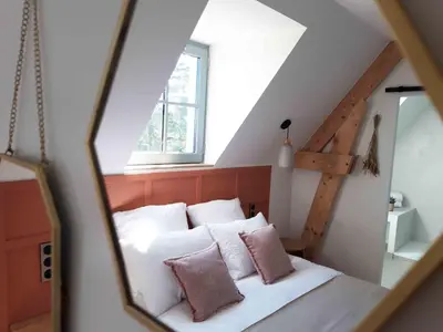 Un ou plusieurs lits dans un hébergement de l'établissement Maison Chemin, chambres d'hôtes à Amboise
