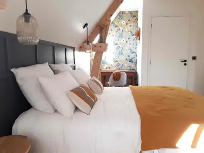 Un ou plusieurs lits dans un hébergement de l'établissement Maison Chemin, chambres d'hôtes à Amboise