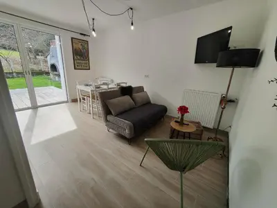 Télévision ou salle de divertissement dans l'établissement Le Beauval enchanté proche zoo & châteaux de la Loire