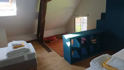 Un ou plusieurs lits dans un hébergement de l'établissement Ma Maison Chambourgeoise