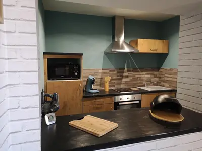 Cuisine ou kitchenette dans l'établissement Studio Centre Ville Chinon