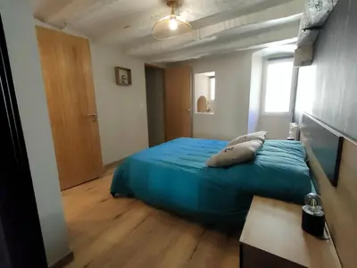 Un ou plusieurs lits dans un hébergement de l'établissement Studio Centre Ville Chinon