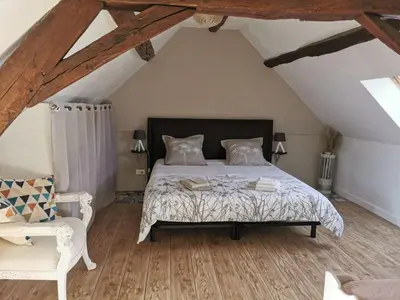 Un ou plusieurs lits dans un hébergement de l'établissement Gîte L'Escale Charmante