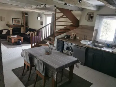 Coin salon dans l'établissement Gîte L'Escale Charmante