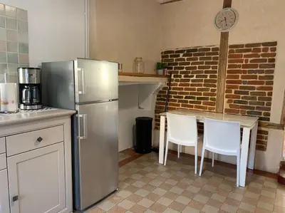 Cuisine ou kitchenette dans l'établissement La Parencelle, proche Boulerie Jump, PEC, Circuit