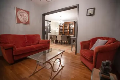 Coin salon dans l'établissement Chambre de Charme dans maison d'hote 