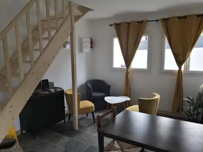 Coin salon dans l'établissement Le Pressoir-Gîte 2-4 personnes