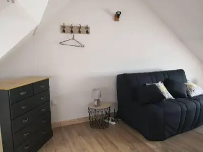 Coin salon dans l'établissement Le Pressoir-Gîte 2-4 personnes